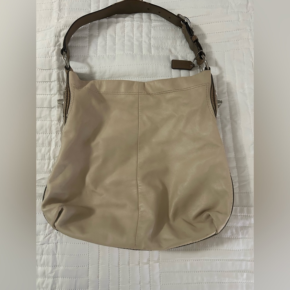 Cream/Tan colored leather coach purse